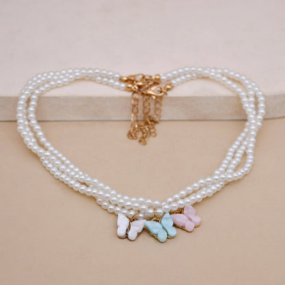 Elegante Perlenkette mit Schmetterling-Anhänger